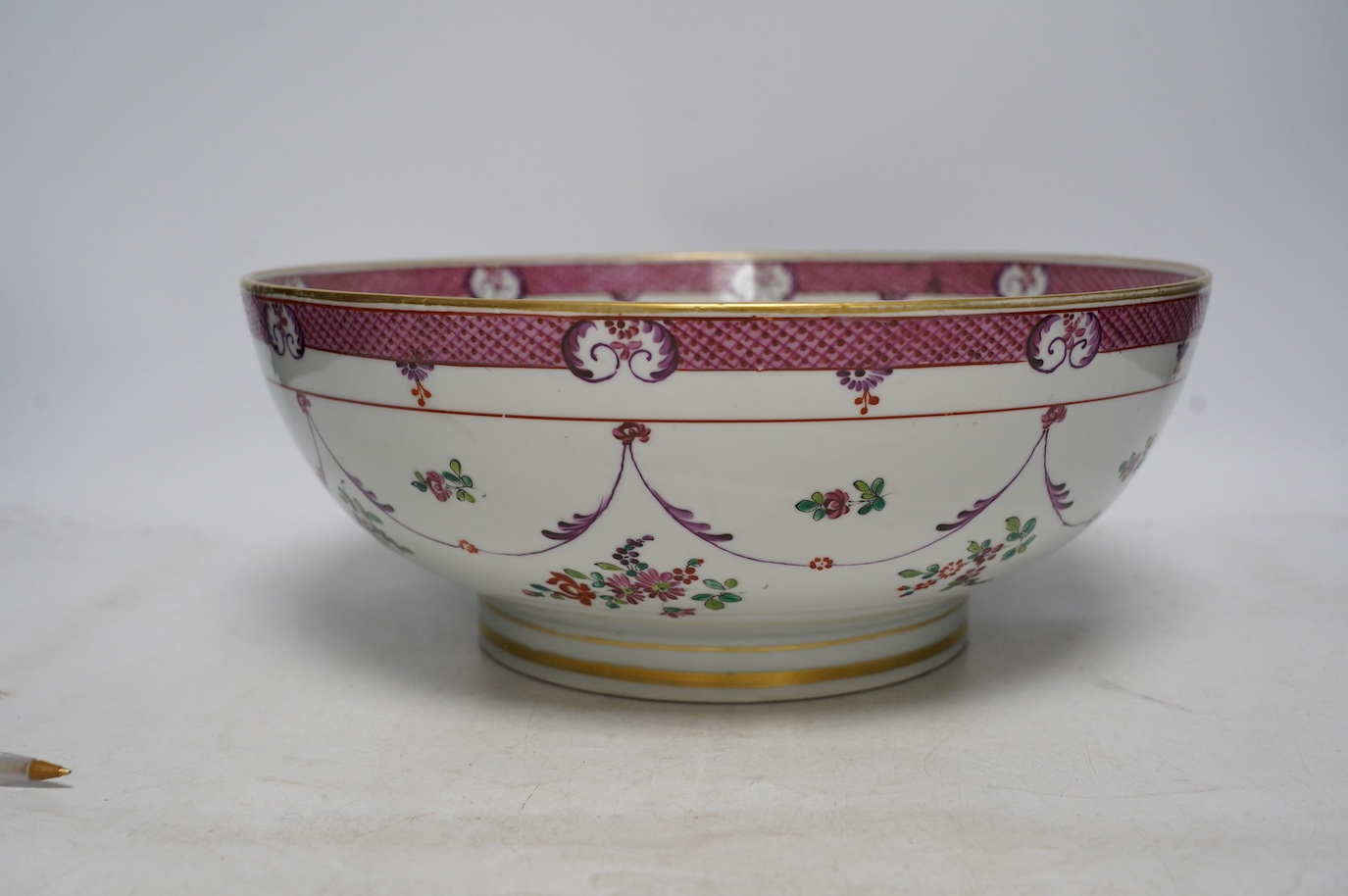 A 19th century Samson famille rose bowl, 32cm diameter. Condition - slight wear to gilding